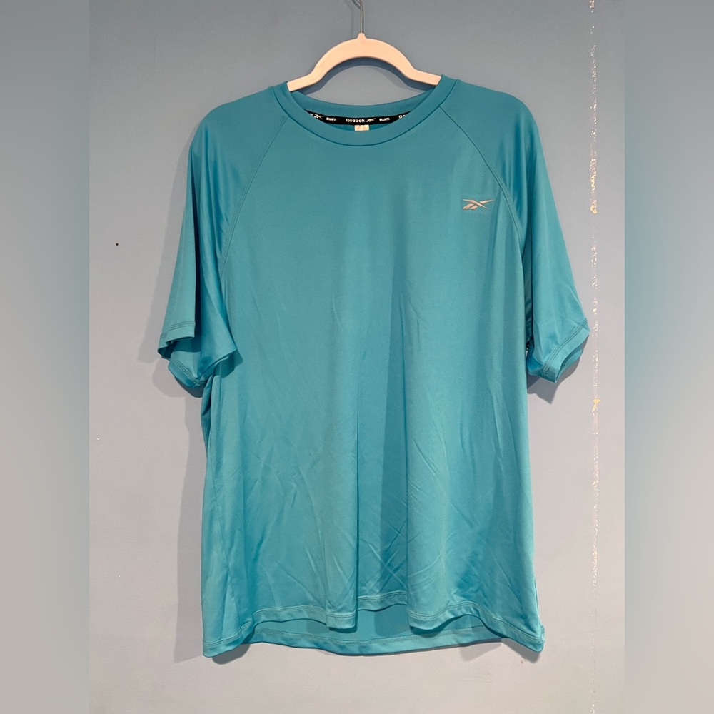 Reebok men’s swim shirt light blue size L